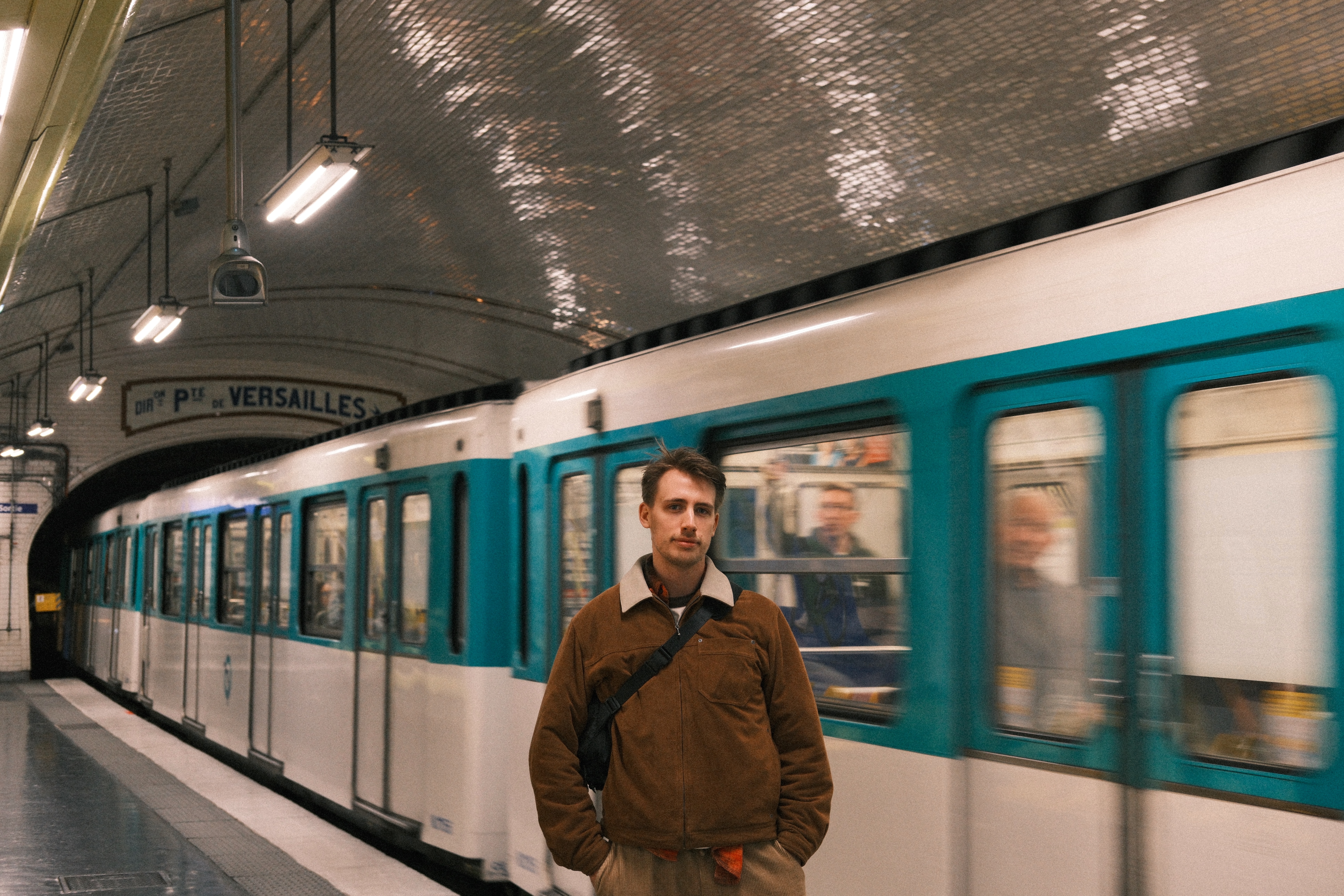 Phil standing on a metro platform